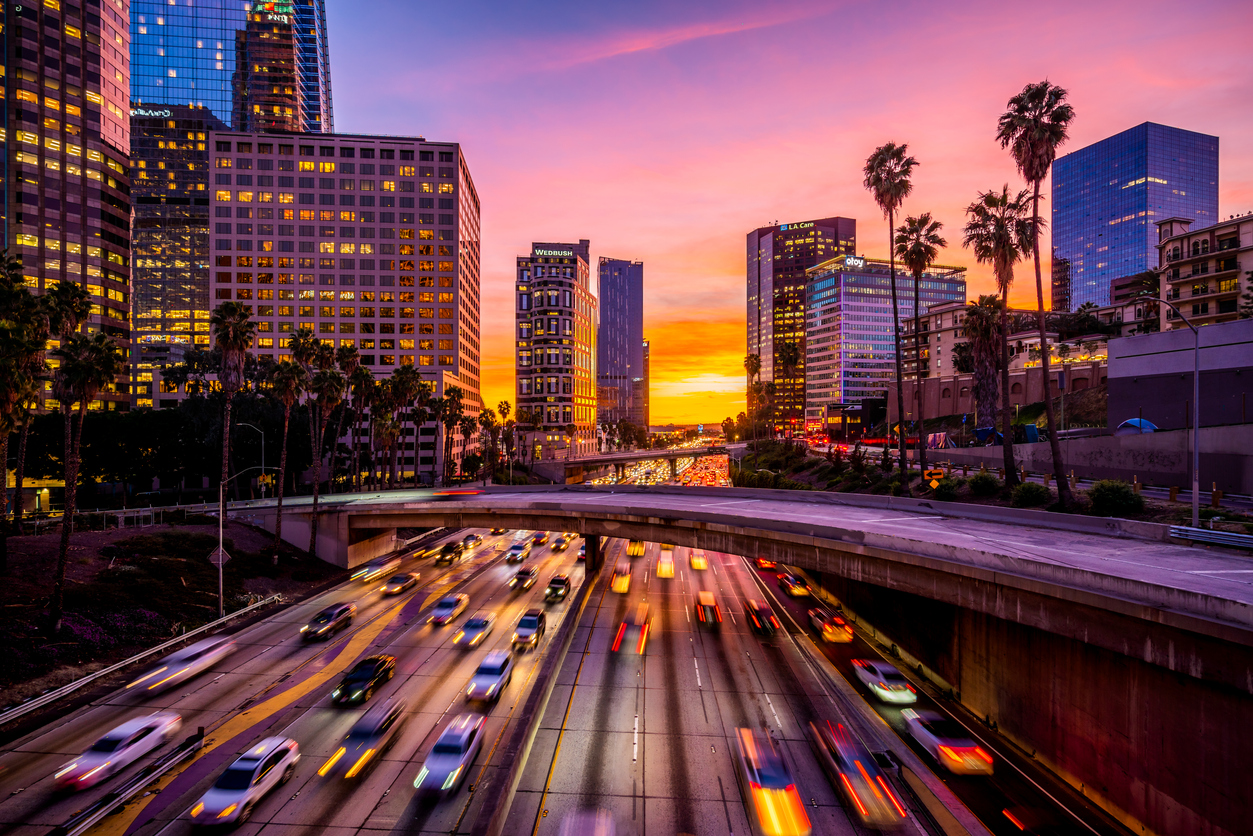 Busy traffic in Downtown Los Angeles at sunset